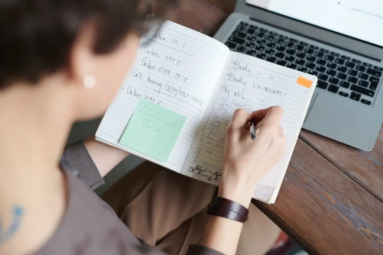 photo of a person writing