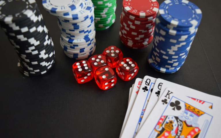 Photo of Playing Cards and Chips